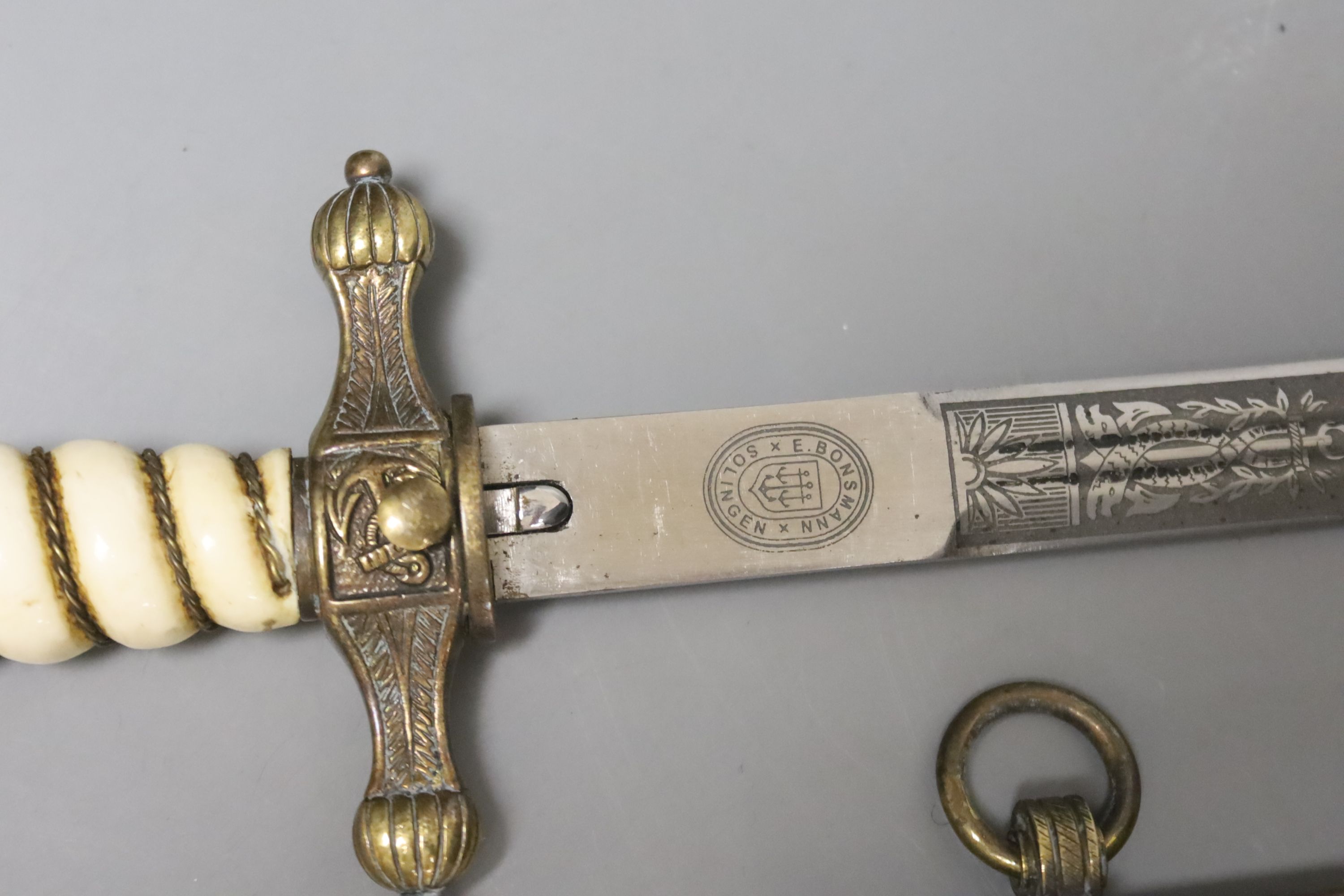 A re-enactors Kreigsmarine dress ceremonial dagger, with brass scabbard, 42cm long